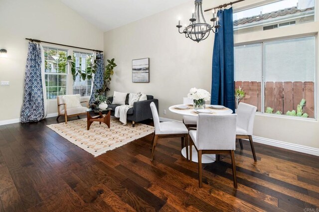 3362 Edgeview, San Marcos, CA 92078 - dining room with a chandelier, wood finished floors, baseboards, and high vaulted ceiling
