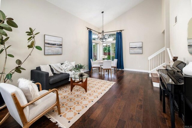 3362 Edgeview, San Marcos, CA 92078 - living area featuring a chandelier, hardwood / wood-style flooring, stairway, baseboards, and high vaulted ceiling