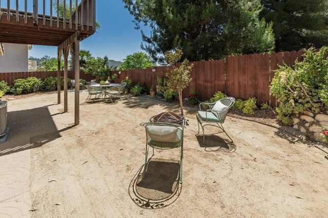 3362 Edgeview, San Marcos, CA 92078 - fenced backyard with an outdoor fire pit, a patio, and outdoor dining space