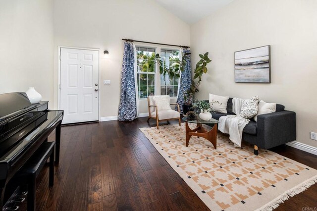 3362 Edgeview, San Marcos, CA 92078 - living room featuring dark wood-type flooring, baseboards, and high vaulted ceiling