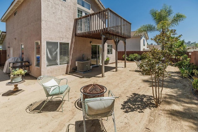 3362 Edgeview, San Marcos, CA 92078 - back of house featuring stucco siding, an outdoor fire pit, and a fenced backyard