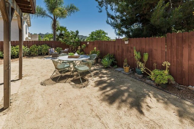 3362 Edgeview, San Marcos, CA 92078 - fenced backyard with a patio area and outdoor dining area