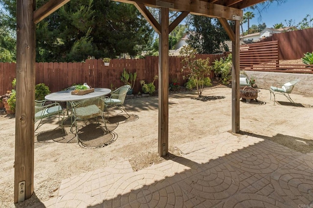 3362 Edgeview, San Marcos, CA 92078 - fenced backyard with a fire pit, a patio, and outdoor dining space