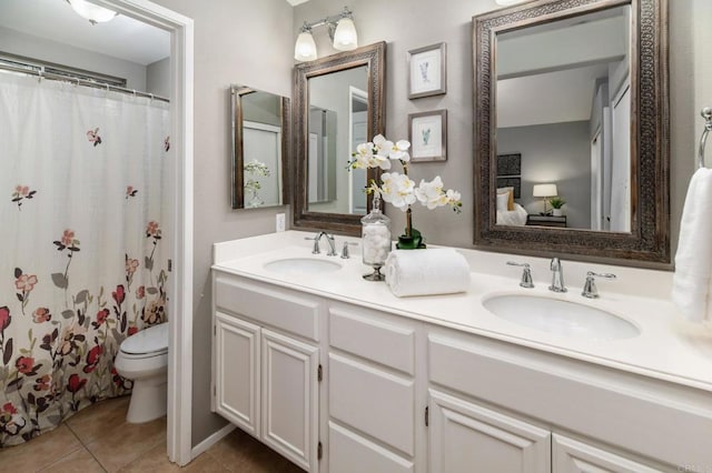 3362 Edgeview, San Marcos, CA 92078 - full bathroom featuring toilet, double vanity, tile patterned floors, and a shower with shower curtain