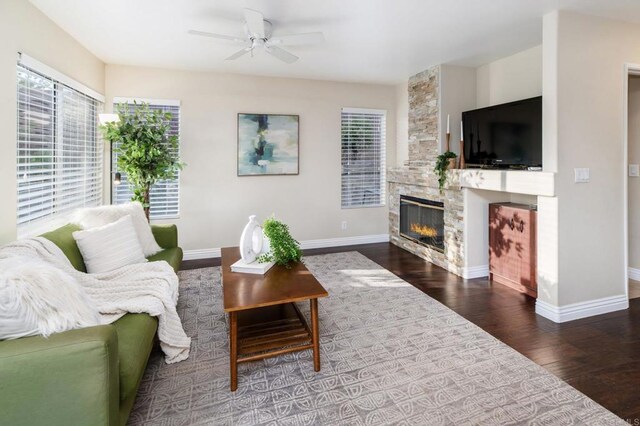 3362 Edgeview, San Marcos, CA 92078 - living room featuring a fireplace, a ceiling fan, wood finished floors, and baseboards