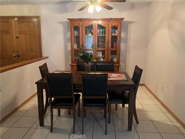 7218 Dalscote St, Hesperia, CA 92345 - dining room with a ceiling fan, light tile patterned floors, and baseboards
