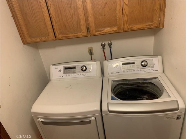 7218 Dalscote St, Hesperia, CA 92345 - laundry area with independent washer and dryer and cabinet space
