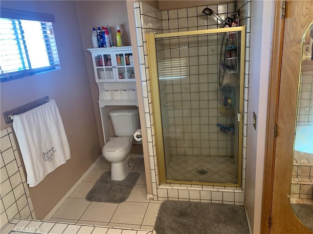 7218 Dalscote St, Hesperia, CA 92345 - full bath featuring tile patterned floors, a shower stall, toilet, and baseboards
