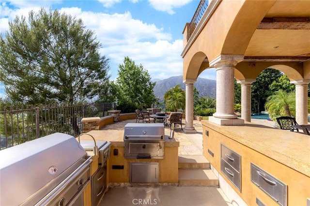 367 Monterey Pines Dr, Arcadia, CA 91006 - view of patio featuring area for grilling, a mountain view, grilling area, and outdoor dining space