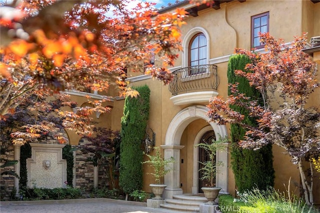 367 Monterey Pines Dr, Arcadia, CA 91006 - doorway to property with a balcony and stucco siding