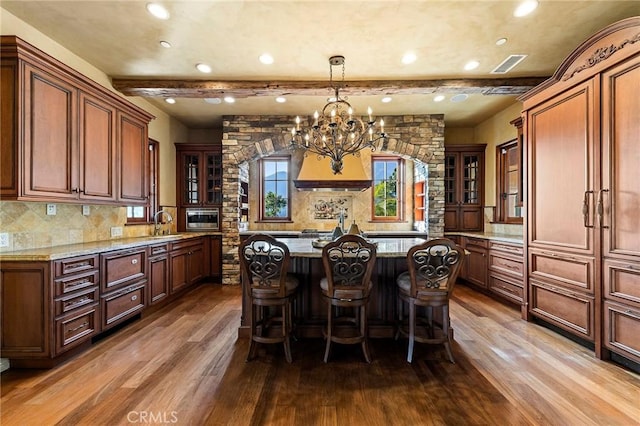 367 Monterey Pines Dr, Arcadia, CA 91006 - kitchen featuring dark wood-style floors, recessed lighting, glass insert cabinets, a chandelier, and light stone counters