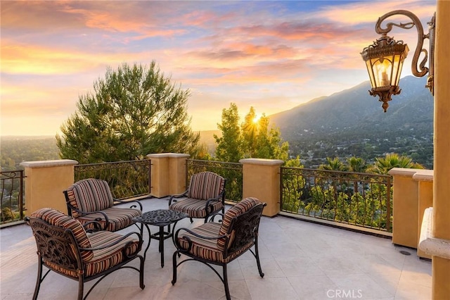 367 Monterey Pines Dr, Arcadia, CA 91006 - patio terrace at dusk featuring an outdoor living space, a mountain view, and a balcony