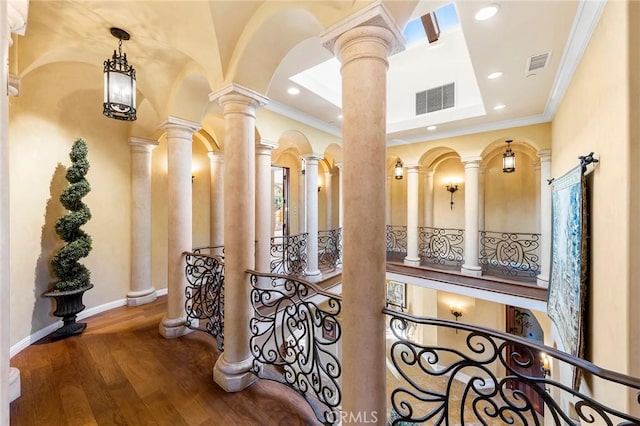 367 Monterey Pines Dr, Arcadia, CA 91006 - hallway with crown molding, wood finished floors, recessed lighting, and decorative columns
