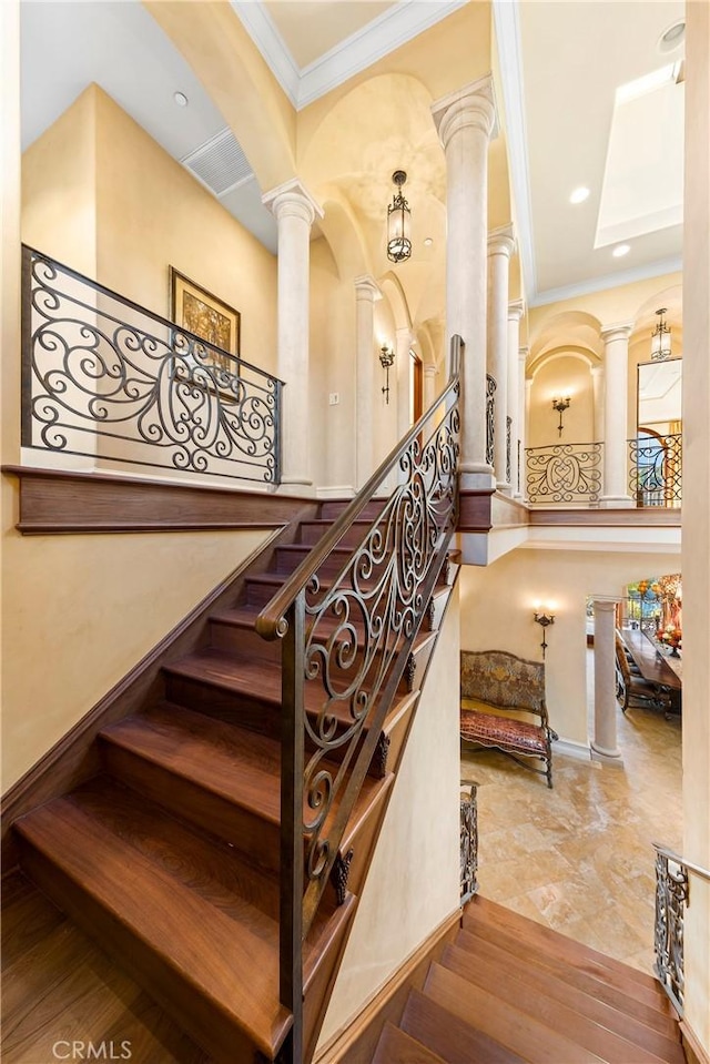 367 Monterey Pines Dr, Arcadia, CA 91006 - stairs featuring decorative columns, ornamental molding, and recessed lighting