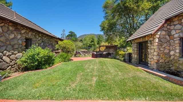 2304 Rosedale Curv, Upland, CA 91784 - view of green lawn featuring french doors and a mountain view