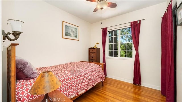 2304 Rosedale Curv, Upland, CA 91784 - bedroom with wood finished floors, baseboards, and a ceiling fan