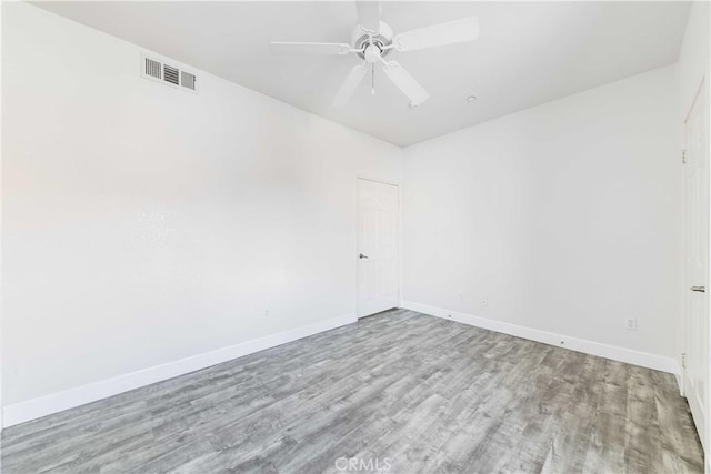 41410 Juniper St Unit 2622, Murrieta, CA 92562 - spare room featuring wood finished floors, baseboards, and a ceiling fan