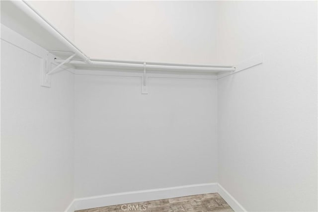 41410 Juniper St Unit 2622, Murrieta, CA 92562 - walk in closet with light wood finished floors