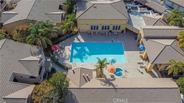 41410 Juniper St Unit 2622, Murrieta, CA 92562 - aerial view of property and surrounding area featuring a pool area