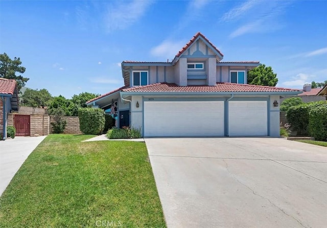 3079 Mojave Ct, Highland, CA 92346 - mediterranean / spanish-style house featuring a tiled roof, stucco siding, concrete driveway, and a garage