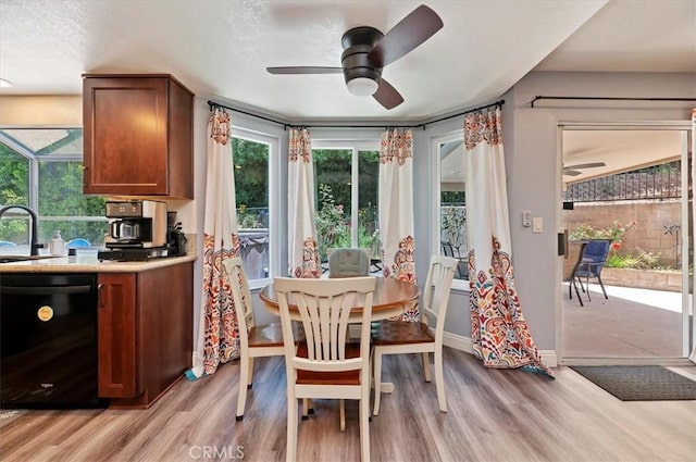 3079 Mojave Ct, Highland, CA 92346 - dining room featuring ceiling fan, light wood-type flooring, and baseboards