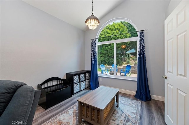 3079 Mojave Ct, Highland, CA 92346 - bedroom with vaulted ceiling, wood finished floors, a chandelier, and baseboards