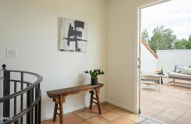 12603 Moorpark St Unit 303, Studio City, CA 91604 - doorway with light tile patterned floors and baseboards