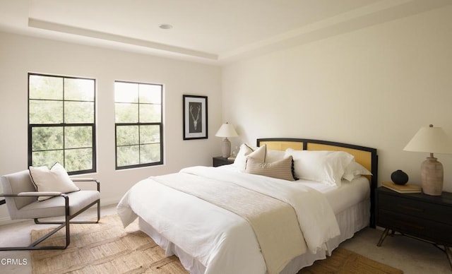 12603 Moorpark St Unit 303, Studio City, CA 91604 - bedroom featuring light carpet and a tray ceiling
