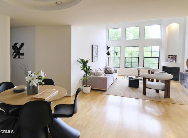 12603 Moorpark St Unit 303, Studio City, CA 91604 - dining space featuring wood finished floors and a fireplace