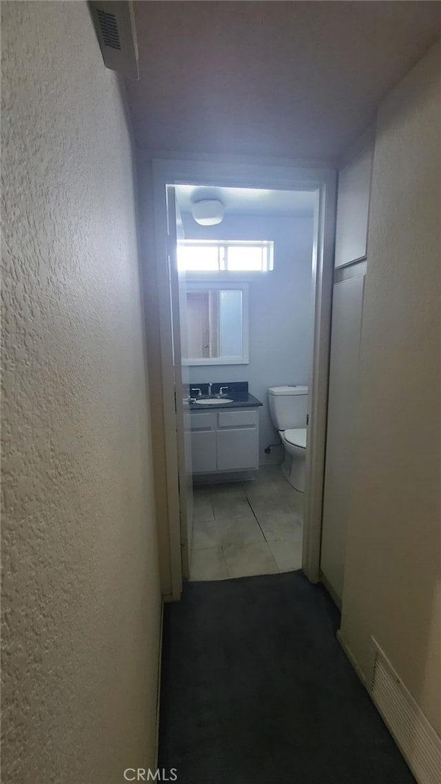 2059 E Yale St, Ontario, CA 91764 - hall with a sink and a textured wall