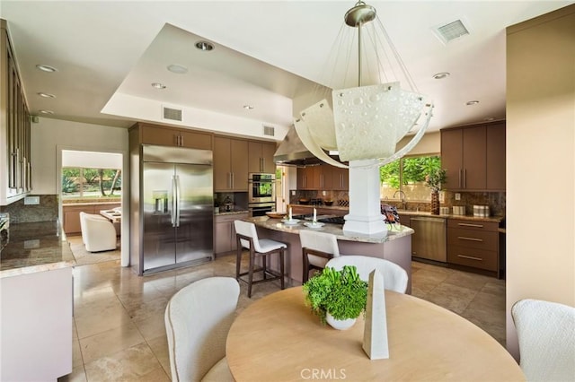 3336 Villa Mesa Rd, Pasadena, CA 91107 - dining area with recessed lighting, light tile patterned floors, and decorative columns