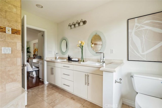 3336 Villa Mesa Rd, Pasadena, CA 91107 - full bathroom with double vanity, toilet, and tile patterned flooring