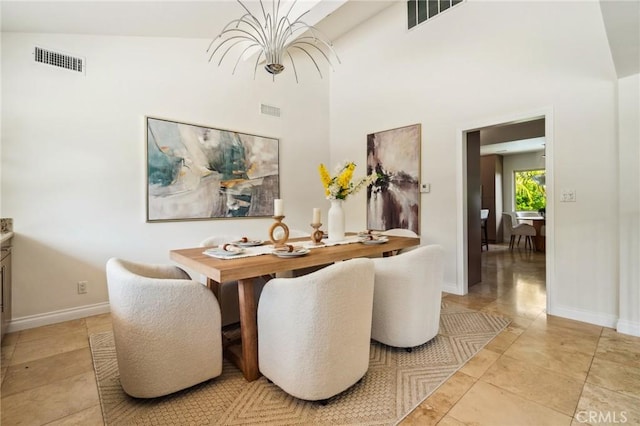 3336 Villa Mesa Rd, Pasadena, CA 91107 - dining area featuring a chandelier, a towering ceiling, baseboards, and light tile patterned floors