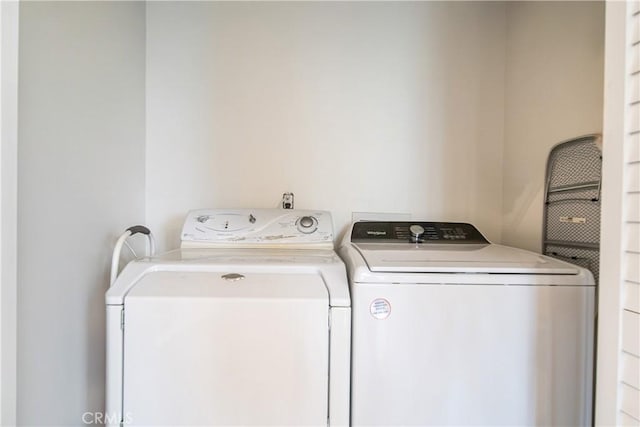 15439 Studebaker Rd, Norwalk, CA 90650 - laundry area featuring independent washer and dryer