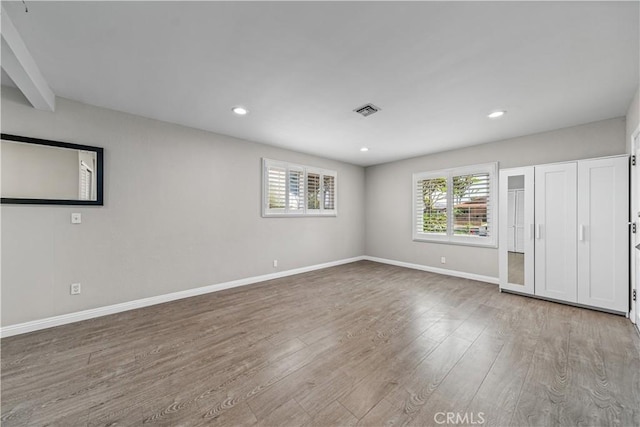 15439 Studebaker Rd, Norwalk, CA 90650 - empty room featuring wood finished floors, baseboards, and recessed lighting