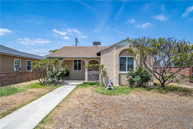 15439 Studebaker Rd, Norwalk, CA 90650 - single story home with covered porch, stucco siding, fence, and a shingled roof