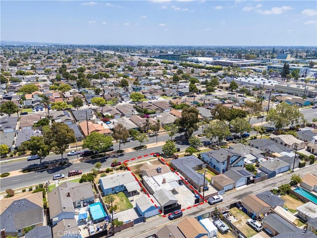 15439 Studebaker Rd, Norwalk, CA 90650 - aerial perspective of suburban area with property parcel outlined