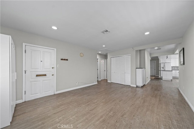 15439 Studebaker Rd, Norwalk, CA 90650 - unfurnished living room featuring baseboards, wood finished floors, and recessed lighting