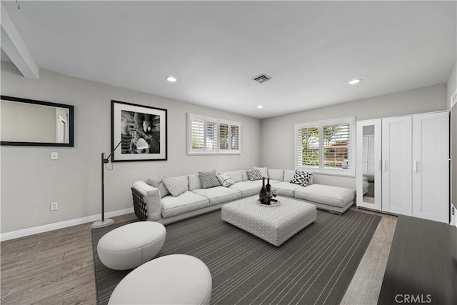 15439 Studebaker Rd, Norwalk, CA 90650 - living room featuring wood finished floors, recessed lighting, and baseboards
