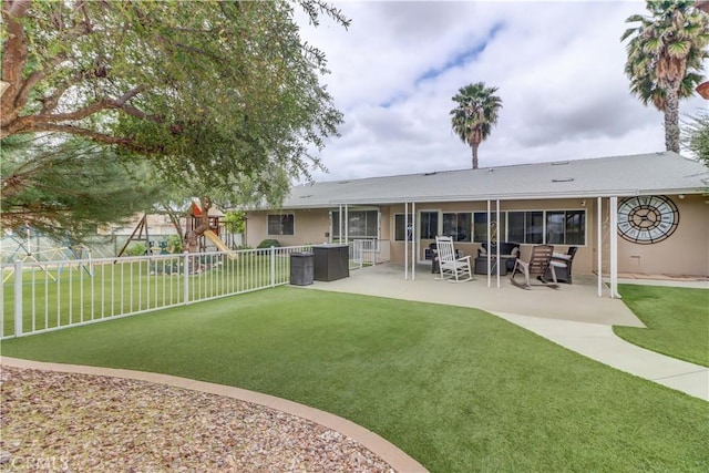 27930 Lexington Ct, Menifee, CA 92586 - back of property featuring a patio, a playground, an outdoor hangout area, and stucco siding