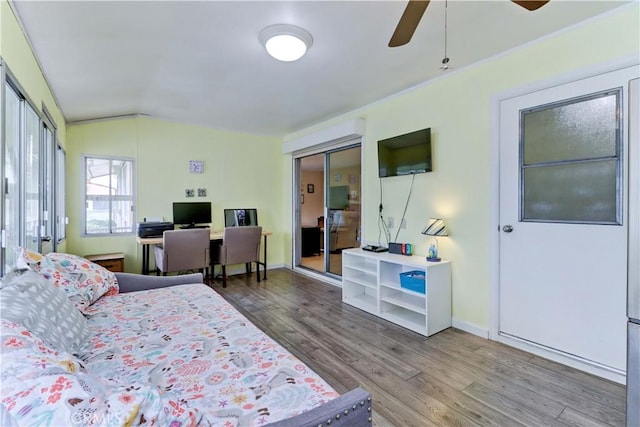 27930 Lexington Ct, Menifee, CA 92586 - bedroom featuring wood finished floors, lofted ceiling, baseboards, a ceiling fan, and an office area
