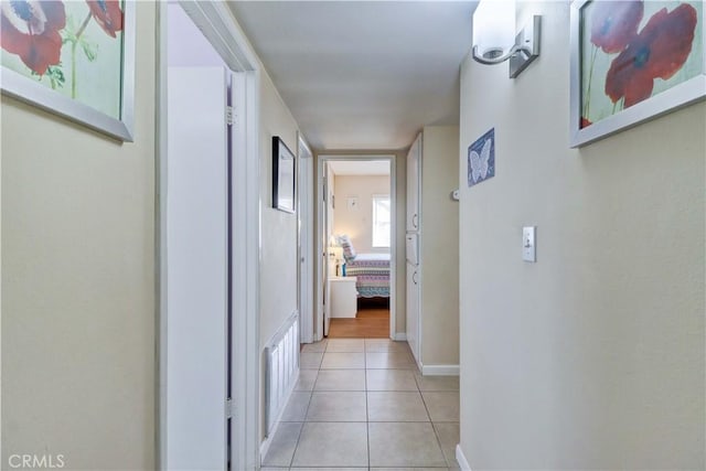 27930 Lexington Ct, Menifee, CA 92586 - hall featuring light tile patterned floors and baseboards