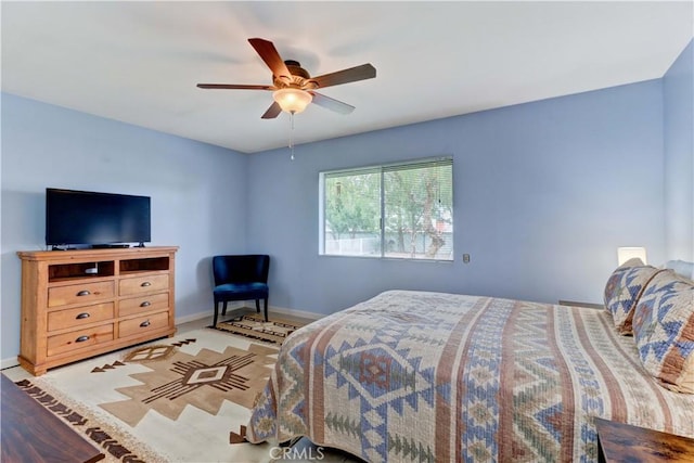 27930 Lexington Ct, Menifee, CA 92586 - bedroom with baseboards and a ceiling fan