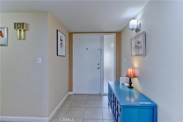27930 Lexington Ct, Menifee, CA 92586 - foyer featuring light tile patterned floors and baseboards
