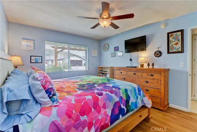 27930 Lexington Ct, Menifee, CA 92586 - bedroom featuring light wood-type flooring, ceiling fan, and baseboards