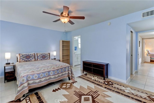 27930 Lexington Ct, Menifee, CA 92586 - bedroom with light tile patterned floors, baseboards, ensuite bath, and a ceiling fan