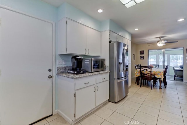 27930 Lexington Ct, Menifee, CA 92586 - kitchen featuring stainless steel appliances, recessed lighting, light tile patterned floors, a ceiling fan, and white cabinetry