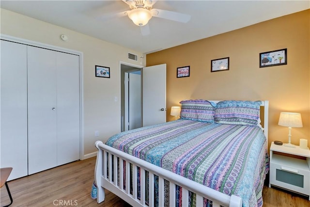 27930 Lexington Ct, Menifee, CA 92586 - bedroom with wood finished floors, a closet, ceiling fan, and baseboards