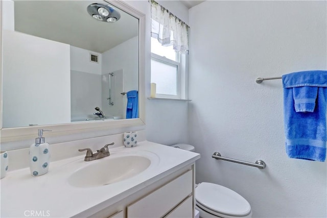 27930 Lexington Ct, Menifee, CA 92586 - bathroom with vanity, toilet, and a shower