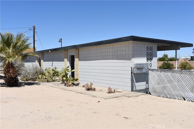 73636 Cactus Dr Unit 29, Palms, CA 92277 - view of front of home featuring fence